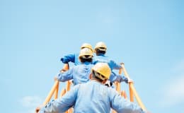 Vetted contractor preparing compliance paperwork on site
